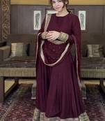 Deep maroon tiered gown with sequin detail