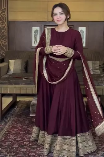 Deep maroon tiered gown with sequin detail