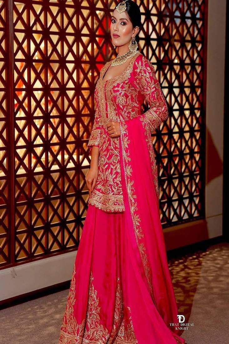Rani pink sequins and embroidery sharara set.