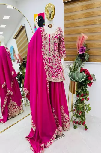 Rani pink sequins and embroidery sharara set.