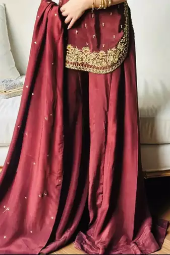 Dark maroon crepe kurta with curved hem