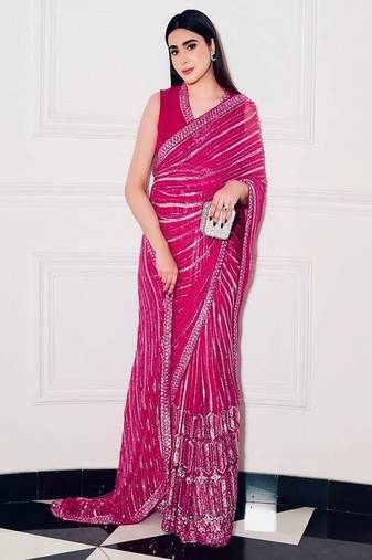 Pink georgette saree with sequins, thread & dori work paired with unstitched japan satin blouse