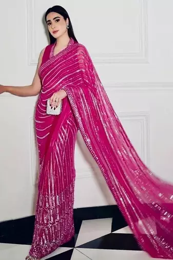 Pink georgette saree with sequins, thread & dori work paired with unstitched japan satin blouse