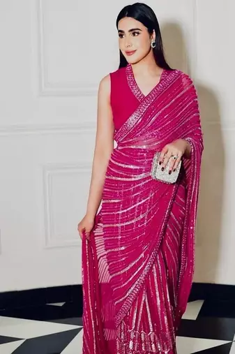Pink georgette saree with sequins, thread & dori work paired with unstitched japan satin blouse
