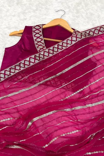 Pink georgette saree with sequins, thread & dori work paired with unstitched japan satin blouse