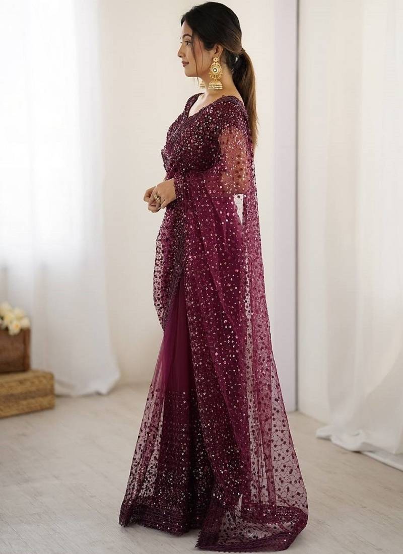 Wine glitter glamour and everything in between mesmerizing net saree set