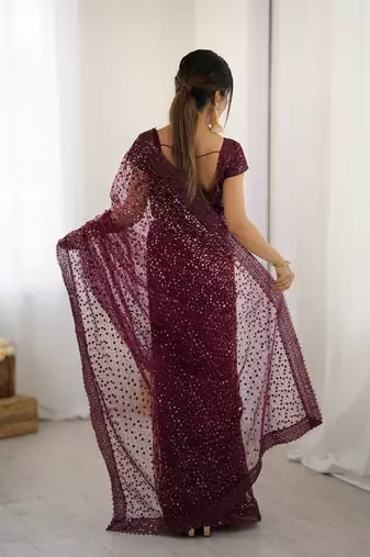 Wine glitter glamour and everything in between mesmerizing net saree set