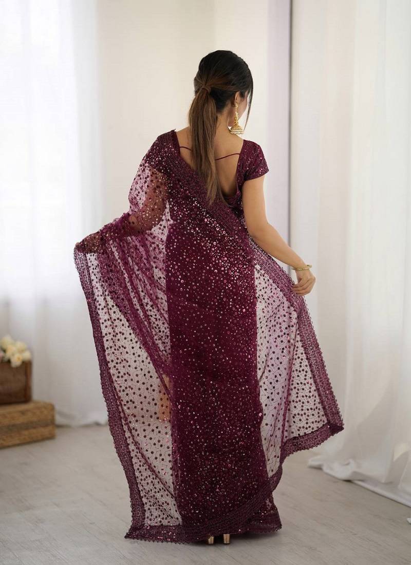Wine glitter glamour and everything in between mesmerizing net saree set