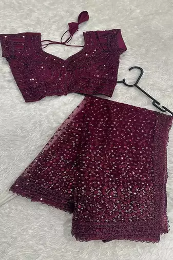 Wine glitter glamour and everything in between mesmerizing net saree set