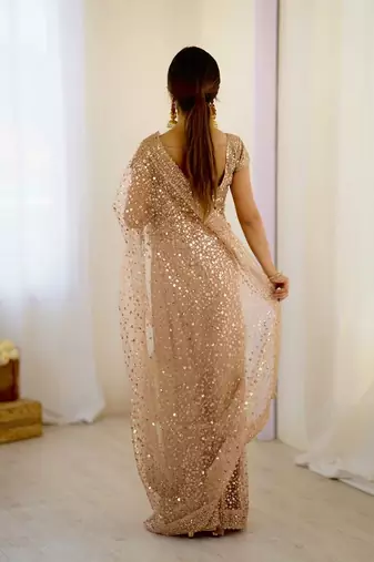 Light beige glitter glamour and everything in between mesmerizing net saree set