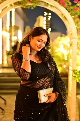 Heavy sequins work black colour saree for festival