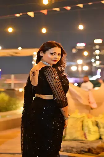 Heavy sequins work black colour saree for festival