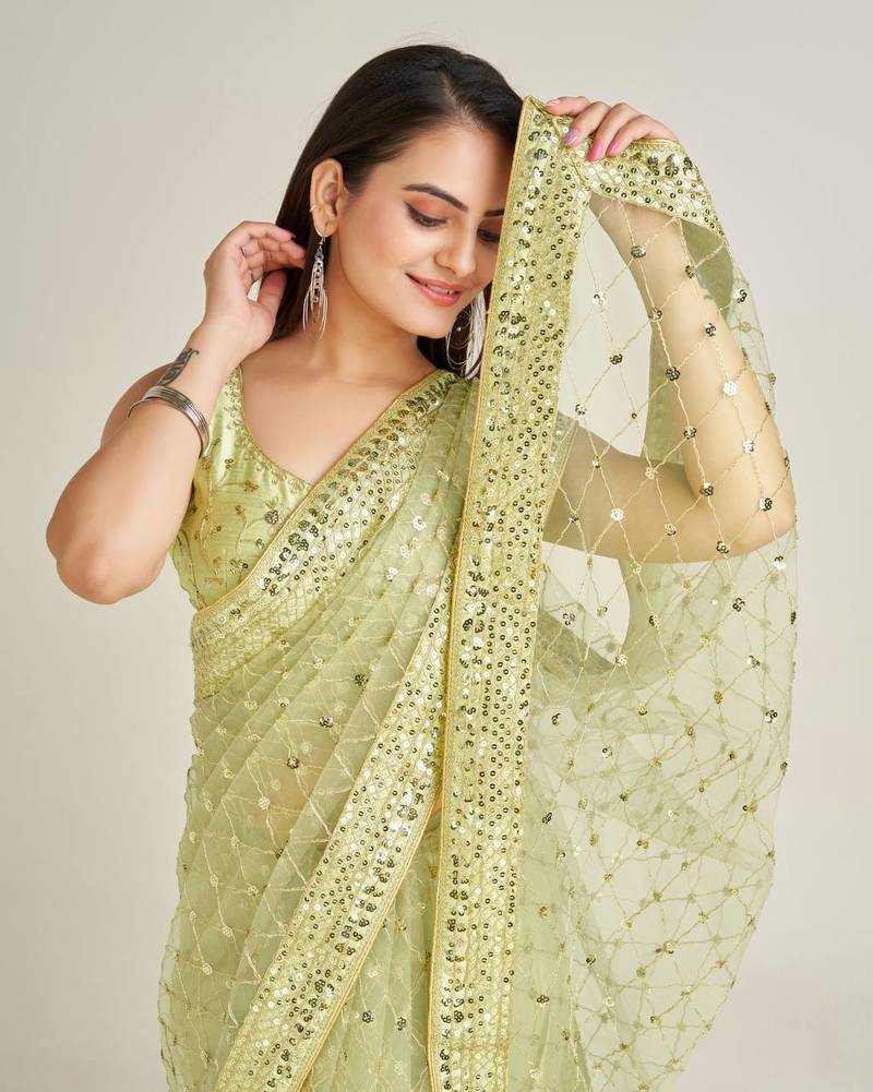Pista elegant net saree with sequins & dori work and banglori silk blouse