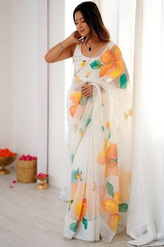 White motif taby silk embellished with beautiful floral print saree set