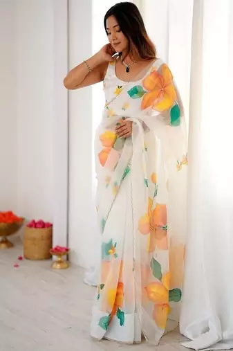 White motif taby silk embellished with beautiful floral print saree set