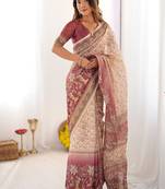Cream handloom cotton saree with floral jaal, peacock motifs & storytelling pallu