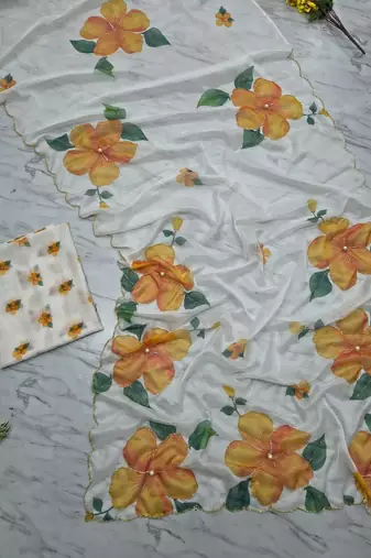 White motif taby silk embellished with beautiful floral print saree set