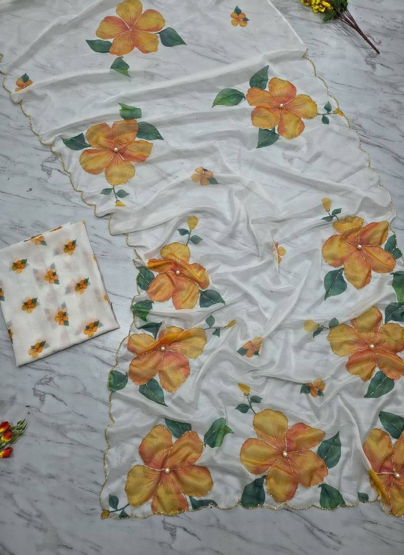 White motif taby silk embellished with beautiful floral print saree set