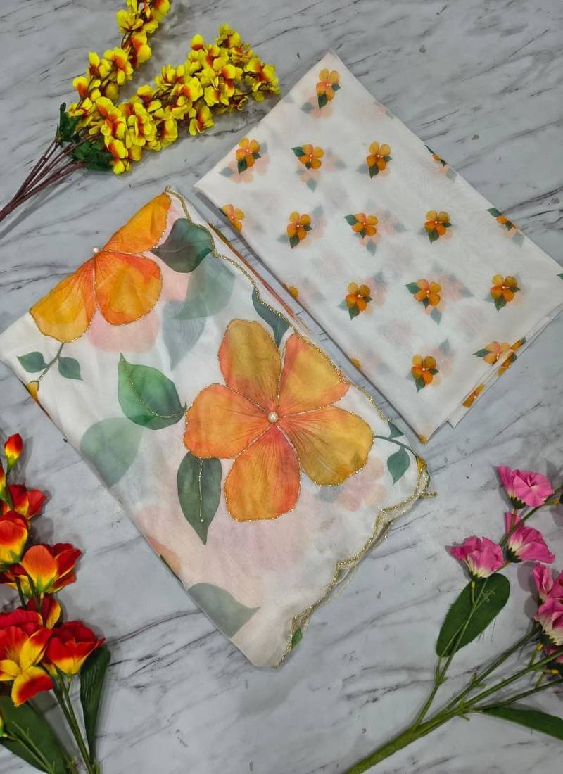 White motif taby silk embellished with beautiful floral print saree set