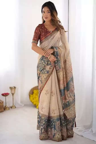 Beige handloom cotton saree with maroon blouse and multicolor royal procession pallu