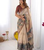 Beige handloom cotton saree with maroon blouse and multicolor royal procession pallu