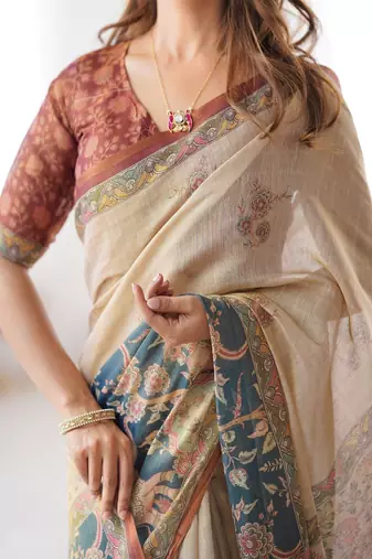 Beige handloom cotton saree with maroon blouse and multicolor royal procession pallu