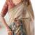Beige handloom cotton saree with maroon blouse and multicolor royal procession pallu