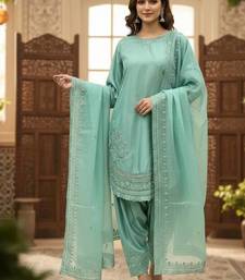 Light- sea-green designer suit