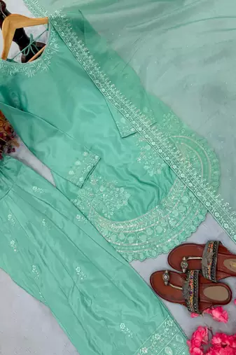 Light- sea-green designer suit