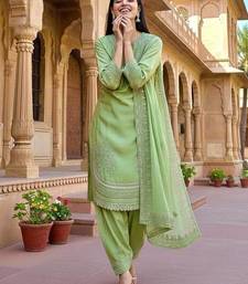 green designer suit