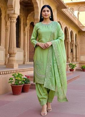 green designer suit 1