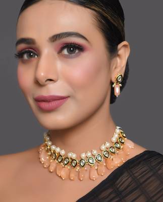 Kundan necklace set with pearls and peach drops 1