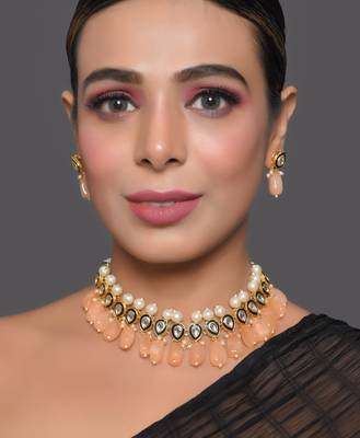 Kundan necklace set with pearls and peach drops 3
