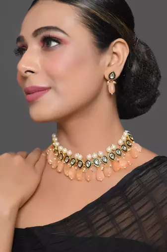 Kundan necklace set with pearls and peach drops