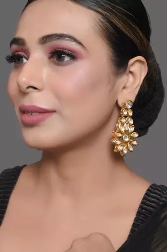Gold toned floral kundan earrings
