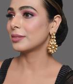 Gold toned floral kundan earrings