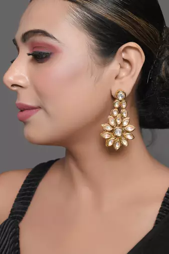 Gold toned floral kundan earrings