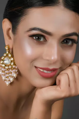 Handcrafted kundan drop earrings with pearl bead tassels
