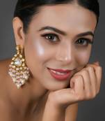Handcrafted kundan drop earrings with pearl bead tassels