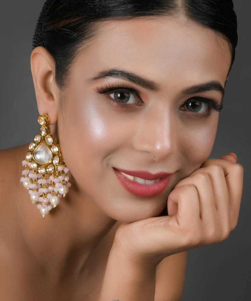 Handcrafted kundan drop earrings with pearl bead tassels