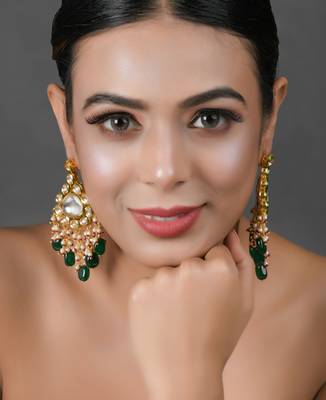 Handcrafted kundan earrings with emerald beads 1