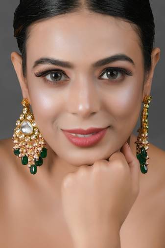 Handcrafted kundan earrings with emerald beads