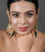 Handcrafted kundan earrings with emerald beads