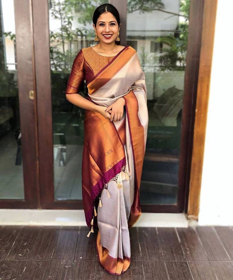 latest contrast brocade pyramid cream saree with unstitched blouse