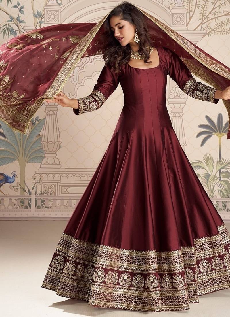 Maroon embroidered work ethnic gown with dupatta