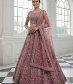 Charming Pink Diamond Work Net Party Wear Lehenga Choli