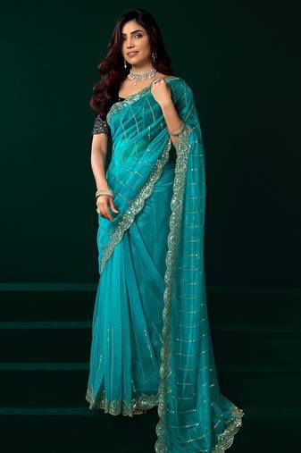Turquoise thread work net party wear saree with velvet blouse