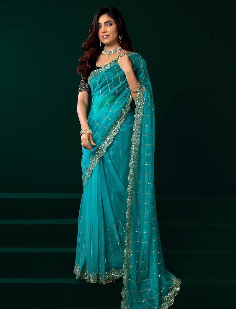 Turquoise thread work net party wear saree with velvet blouse