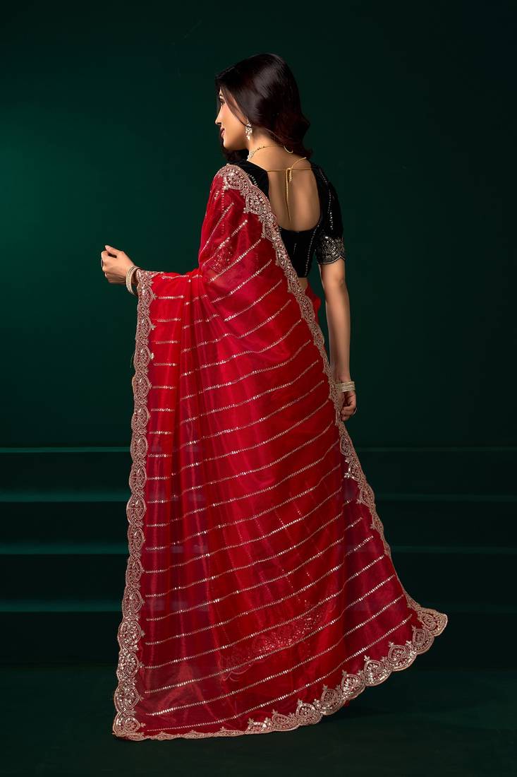 Red thread work net party wear saree with velvet blouse