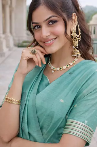 Sea green lillen saree with unstitched blouse piece